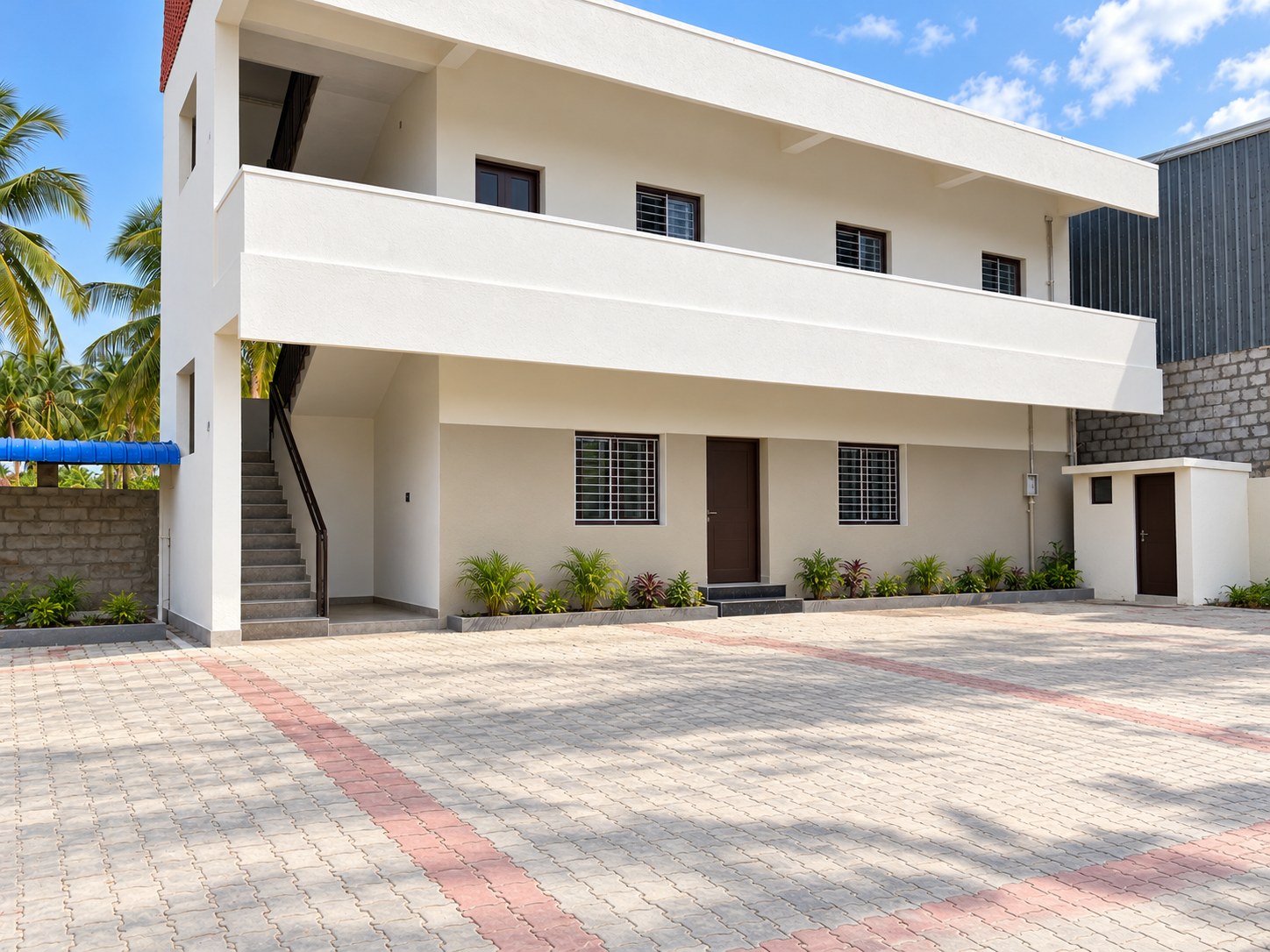 AI-generated finished cover of the Achankulam labour quarters, based on the uploaded site photo